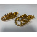 ESTRIBERAS X-POWER SOBREDIMENSIONADAS ORO SUZUKI RMZ 250/450 05-09.