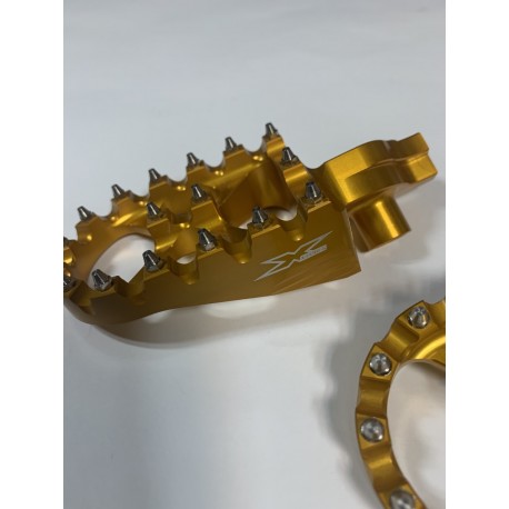 ESTRIBERAS X-POWER SOBREDIMENSIONADAS ORO SUZUKI RMZ 250/450 05-09.